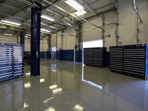 Bright Daylight Racing Garage Interior with Skylights, Empty