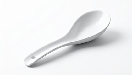 White ceramic Chinese soup spoon on white surface with subtle reflection