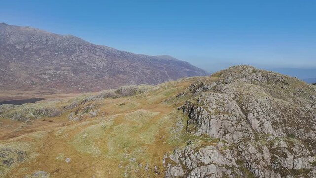 Autumn colours over Llyn Cwmffynnon and Miner&rsquo;s Track - Start Point, road A4086 from a drone, Pen-y-Pass, Snowdonia, Wales, UK