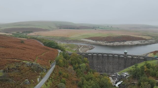 Autumn over Craig Goch Dam from a drone, Elan Valley Reservoirs, Elan Valley, Rhayader, Powys, Wales