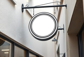 Blank round shop sign mockup hanging on textured white wall | Exterior commercial signage design template for branding | Empty circular store logo display in urban alleyway | Vintage style cafe or bou