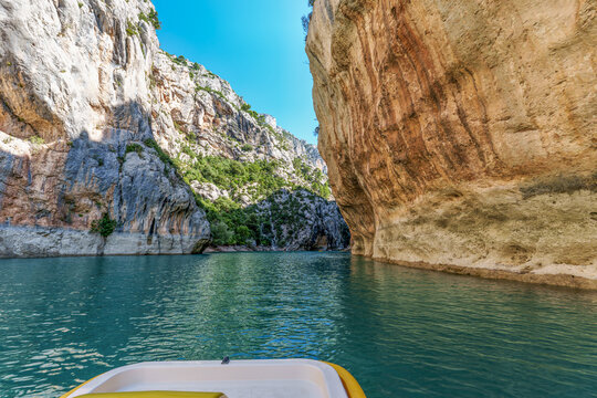 Boat trip on turquoise water of mountain canyon, Verdon Gorge in french Alps, Provence France.