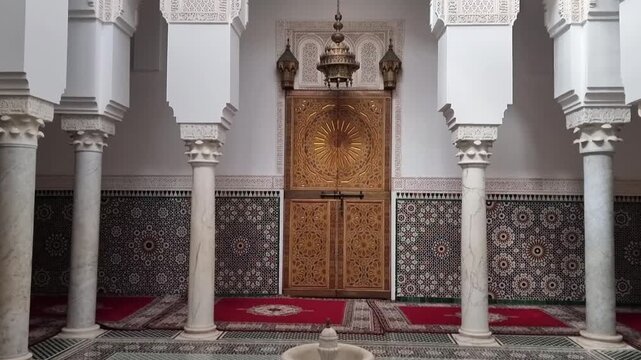 Stunning traditional Moroccan architecture with intricate geometric patterns, ornate arches, and vibrant colors. A timeless display of cultural heritage, artistic craftsmanship, impressively beautiful