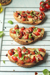 Freshly made bruschetta sandwiches - traditional dish of Italian cuisine	