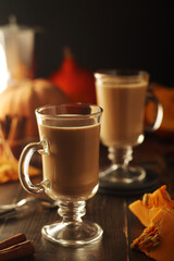 Glasses with warm pumpkin latte	