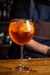 Aperol spritz cocktail on bar counter