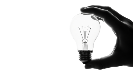 A hand carefully holds a bright glowing lightbulb symbolizing a spark of inspiration and on transparent background