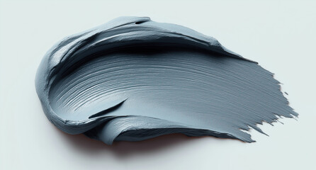 Smooth metallic gray cosmetic cream displays luxurious texture with elegant stroke.