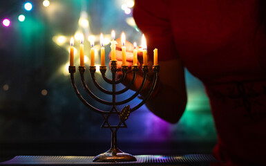 lighting a hanukkah Menorah - Candles With Glittering And David Stars