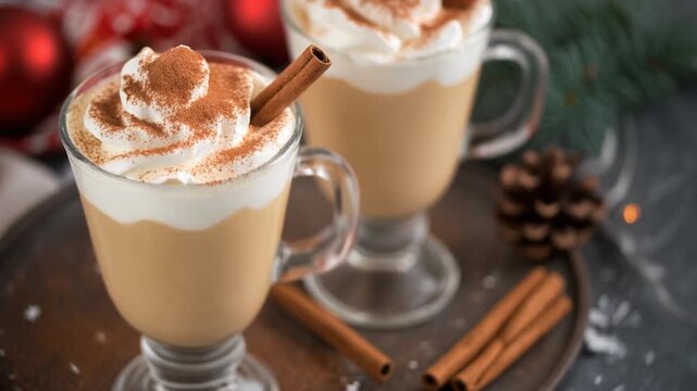 Festive eggnog pudding desserts, topped with whipped cream and sprinkled with cinnamon, mp4 video. AI