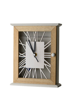 Clock showing 23:55 - five minutes to New Year on white background