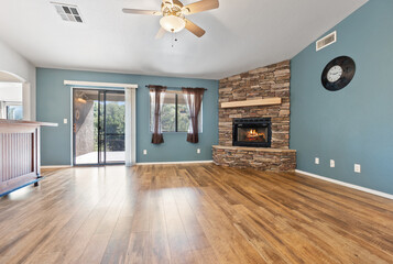 Cozy Living Room with Stone Fireplace and Modern Decor