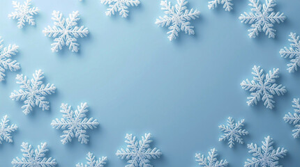 Light blue winter background with frosty white snowflakes around the edges, creating a clean seasonal backdrop with soft texture and empty copy space for holiday design