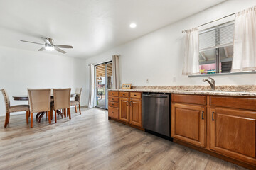 Modern Kitchen and Dining Area Featuring Abundant Natural Light