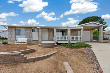 A Charming Modern Home Featuring a Warm and Inviting Front Patio