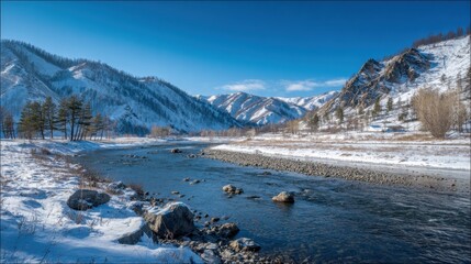 Snow blankets the mountains and banks as a serene river winds through a stunning winter scene.
