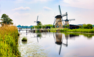Old, Charming Windmills and a Bridge in Kinderdijk, Netherlands