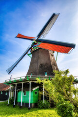 Old Windmill on the River Zaan Riverside at Beautifull Zaanse Schans, Netherlands