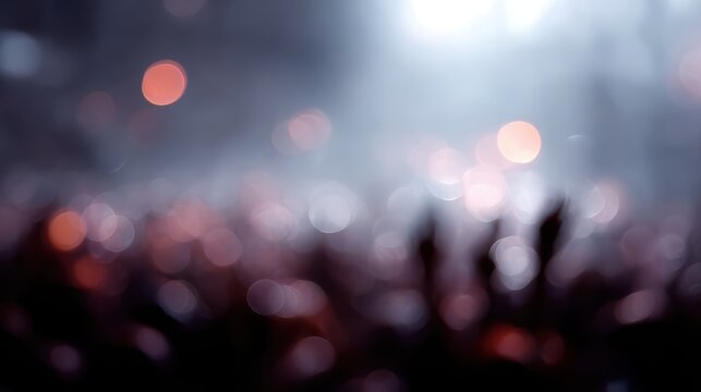 Blurred vibrant crowd enjoying a music performance