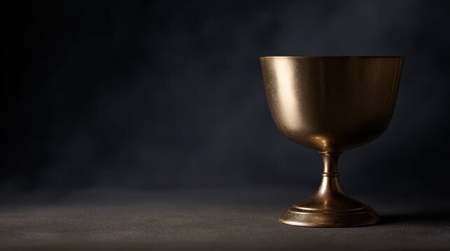 Gold cup for competition success, contest reward, win concept