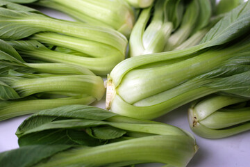 Fresh bok choy on white background.