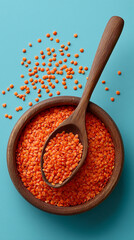 red lentils in a wooden spoon