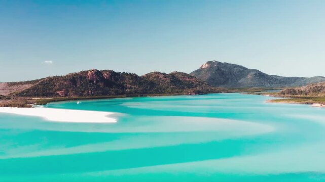 Whitehaven Beach with pristine white silica sand and crystal-clear turquoise waters in Australia
