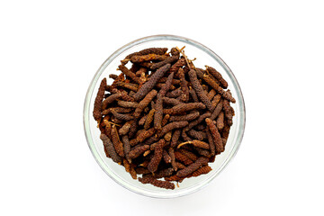 Long pepper (Piper longum), a spice used in traditional medicine and cooking, known for its pungent flavor.