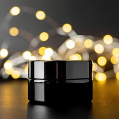 Glossy Black Container with Decorative Bokeh Lights in Soft Focus Against a Dark Background