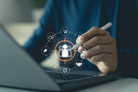 Target customer, customer centric strategies. Businesspeople touching on screen to target customer, buyer persona, customer behavior concept. Marketing plan and strategies. Personalization marketing.