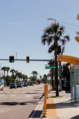 City streets with palm trees on a sunny summer day. A beautiful modern city with skyscrapers and street art. Tampa, Florida, during the holiday season. St.Petersburg, Florida, USA 13 June 2025. 