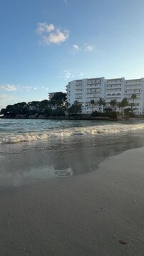 Sunset on Cala Ferrera beach in Cala D'Or village in Mallorca, Spain panoramic view with copy space.