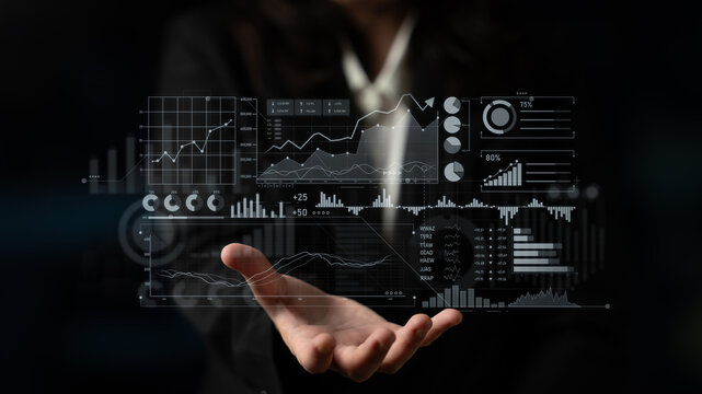 A business professional presents advanced digital data visualization featuring various finance charts and analytics on a sleek black background highlighting modern technology trends. Scalp - Powered by Adobe