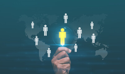 Human resources management concept. Manager holding magnifying glass with highlighted person icon. Recruitment, team management and international talent connection in modern digital business.