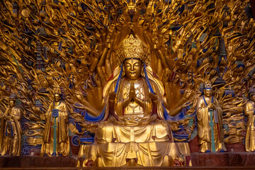 Obraz premium Dazu stone carving of the Thousand-Hand Guanyin located at the Baoding mountain Rock Carvings in Chongqing, China.