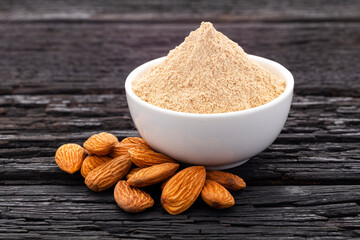 Dried and powdered almonds in the bowl - Prunus dulcis