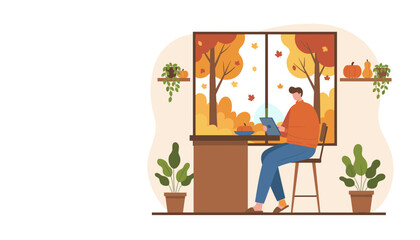 Man working on tablet from home in cozy autumn setting