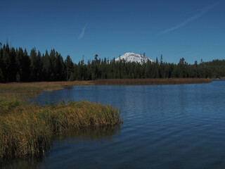 Broken Top in the Cascade Mountains viewed from Little Lava Lake on a sunny fall day.
