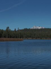 Broken Top in the Cascade Mountains viewed from Little Lava Lake on a sunny fall day.