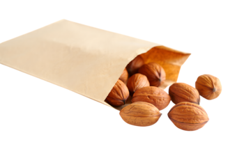 Brown paper bag with nuts spilling out isolated on transparent background