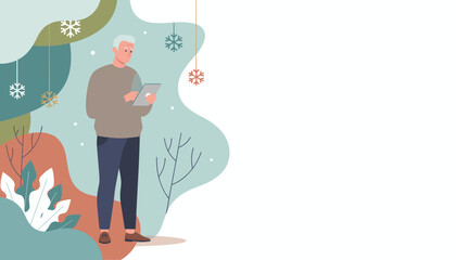 Older man using a tablet in a cozy stylized winter scene with snowflakes and copy space