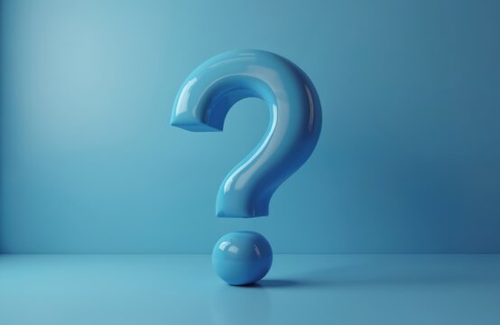 Large glossy blue question mark rests on simple studio floor. Clean blue backdrop creates isolated symbol for inquiry or uncertainty. Minimalist abstract concept.