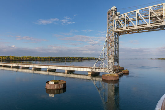 The Road Leading to Larocque Lift Bridge on the Canal de Beauharnois, St. Lawrence River in Quebec, Canada as Seen from the deck of a Cruise Ship