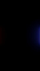 Abstract Silhouette of Red and Blue Light Beams on Black Background image 2