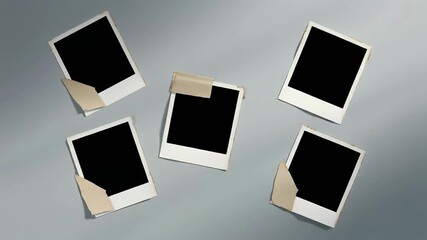 Animated Blank Instant Photo Frames Appearing on Grey Background with Copy Space