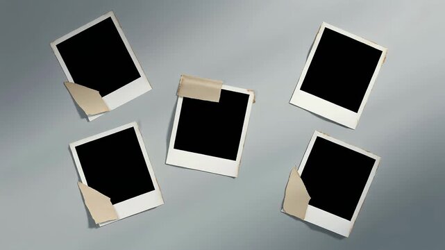Animated Blank Instant Photo Frames Appearing on Grey Background with Copy Space