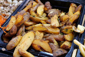Fried potatoes. Various foods in fast food restaurant