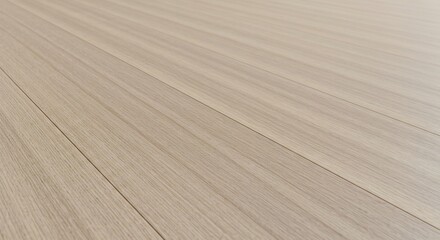 Lightcolored wooden floorboards laid diagonally showing a smooth surface with subtle wood grain and parallel lines