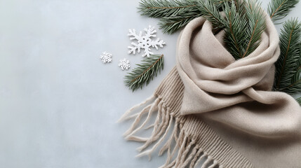 Winter flat lay with pine branches and scarf