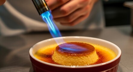 Caramelizing crème brûlée with torch in chef’s hand, dramatic warm kitchen lighting, gourmet dessert photography for high-end culinary branding